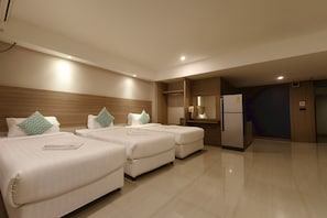 Premier Triple Room | Minibar, in-room safe, desk, free WiFi