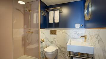 Shower, free toiletries, hair dryer, towels