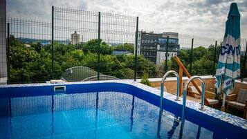 Seasonal outdoor pool, sun loungers
