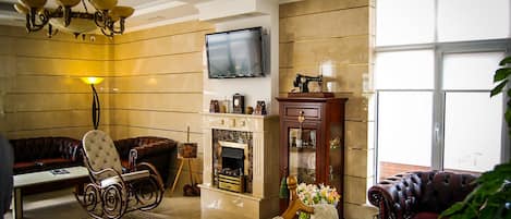 40-inch flat-screen TV with cable channels, TV