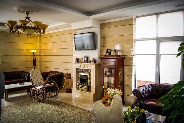 Televisión de pantalla plana de 40 pulgadas con canales por cable