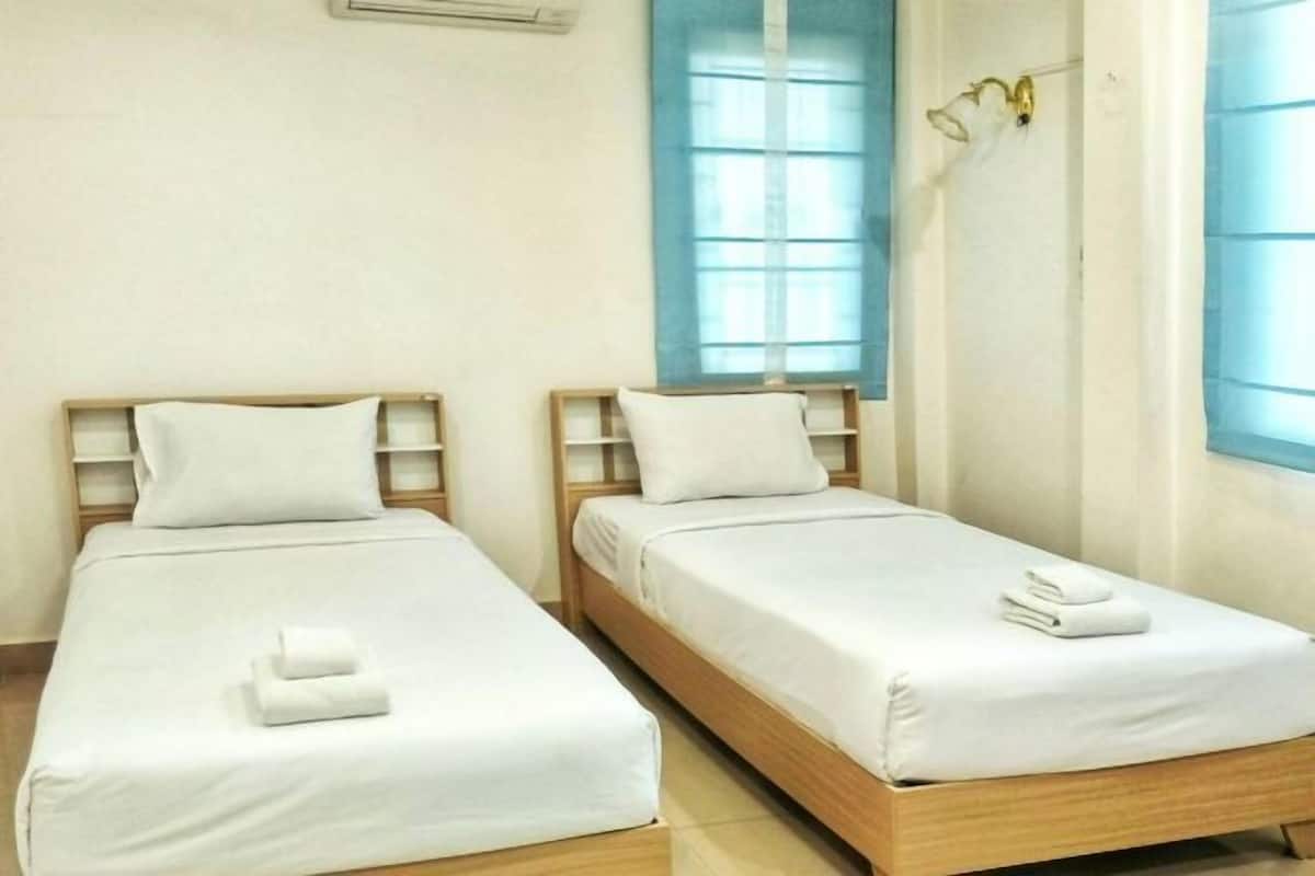 Desk, blackout curtains, free WiFi, bed sheets
