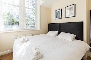 Standaard appartement, 3 slaapkamers | 1 slaapkamer, een strijkplank/strijkijzer, gratis wifi