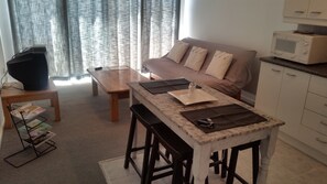 Comfort Apartment, 2 Bedrooms (Mutual) | Living area | 40-cm flat-screen TV with satellite channels, TV - Bradclin @ Mutual (Cape Town)