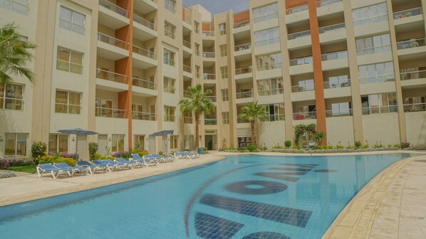 2 outdoor pools, pool umbrellas, sun loungers