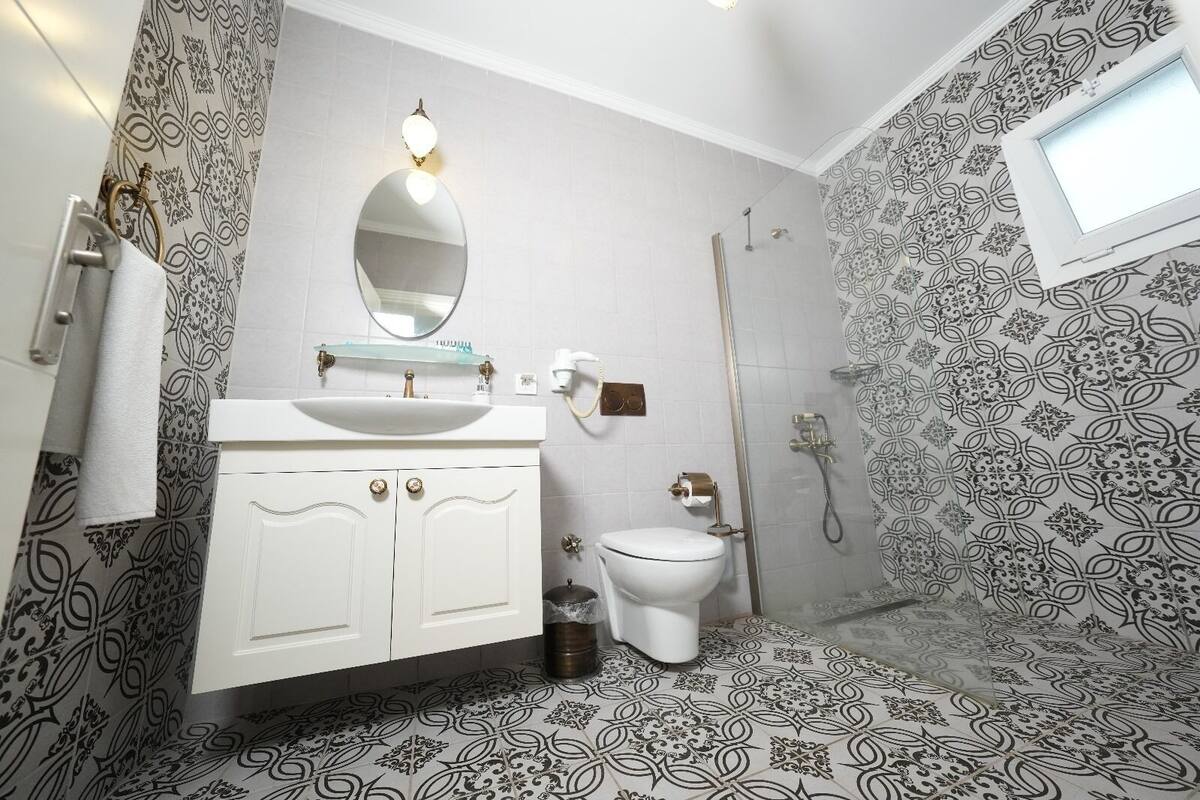 standard double room, pool view | bathroom | shower, free toiletries, hair dryer, slippers