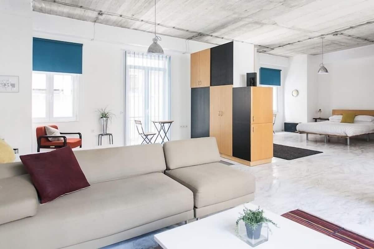 Deluxe Studio with Balcony | Living area | Flat-screen TV