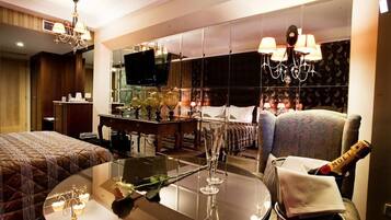 Junior Suite, Pool View | In-room safe, desk, laptop workspace, soundproofing