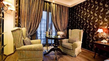 Junior Suite, Pool View | In-room safe, desk, laptop workspace, soundproofing
