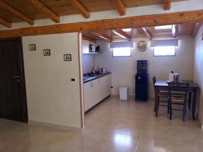 Full-sized fridge, microwave, espresso maker, cookware/dishes/utensils