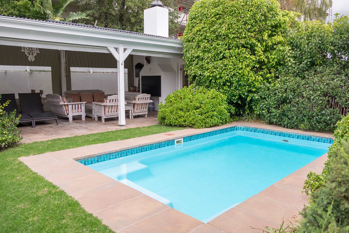 Outdoor pool, pool umbrellas, pool loungers