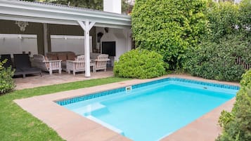 Outdoor pool, pool umbrellas, pool loungers
