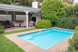 Outdoor pool, pool umbrellas, sun loungers