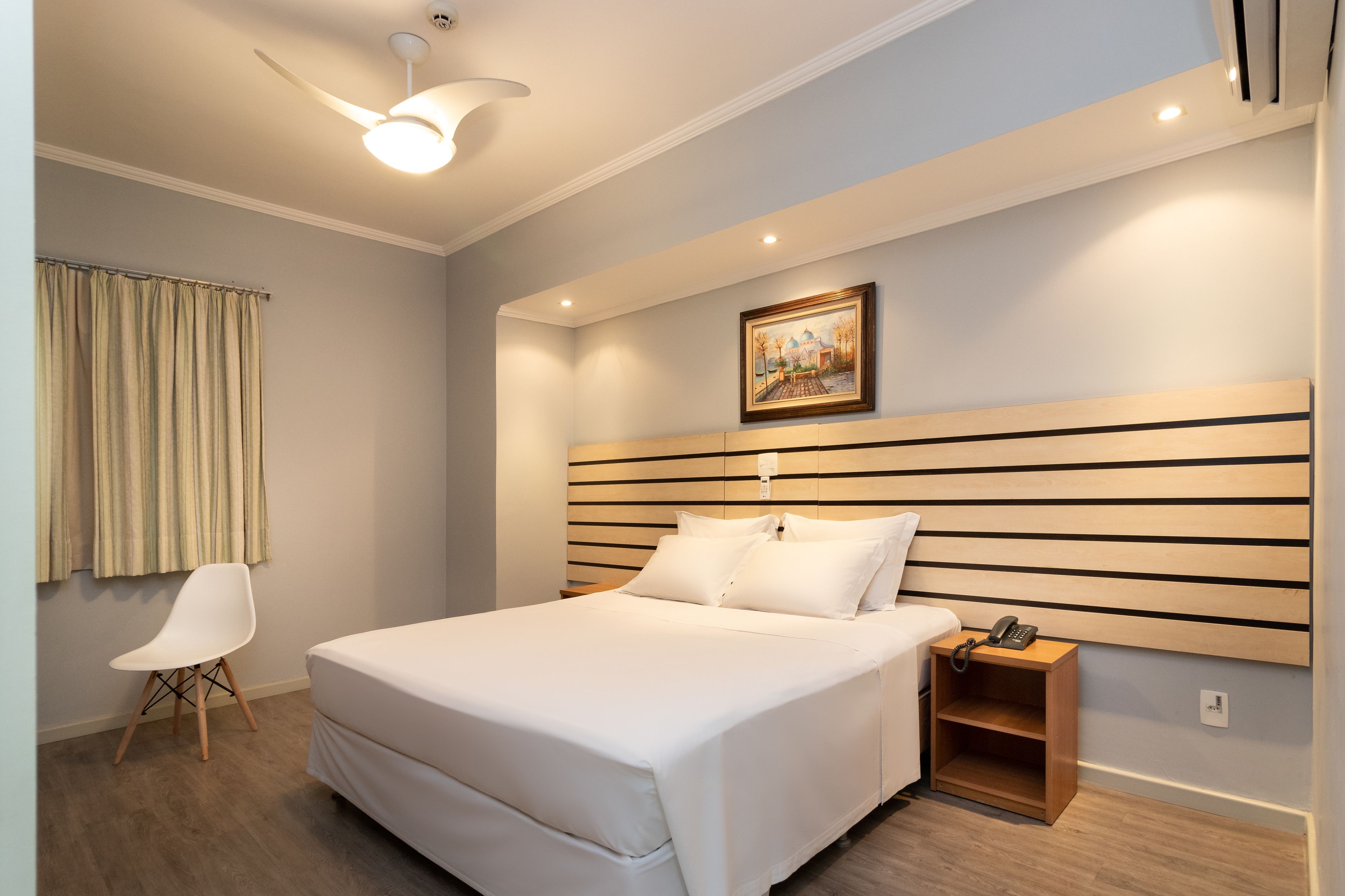 deluxe double room | minibar, in-room safe, desk, blackout curtains