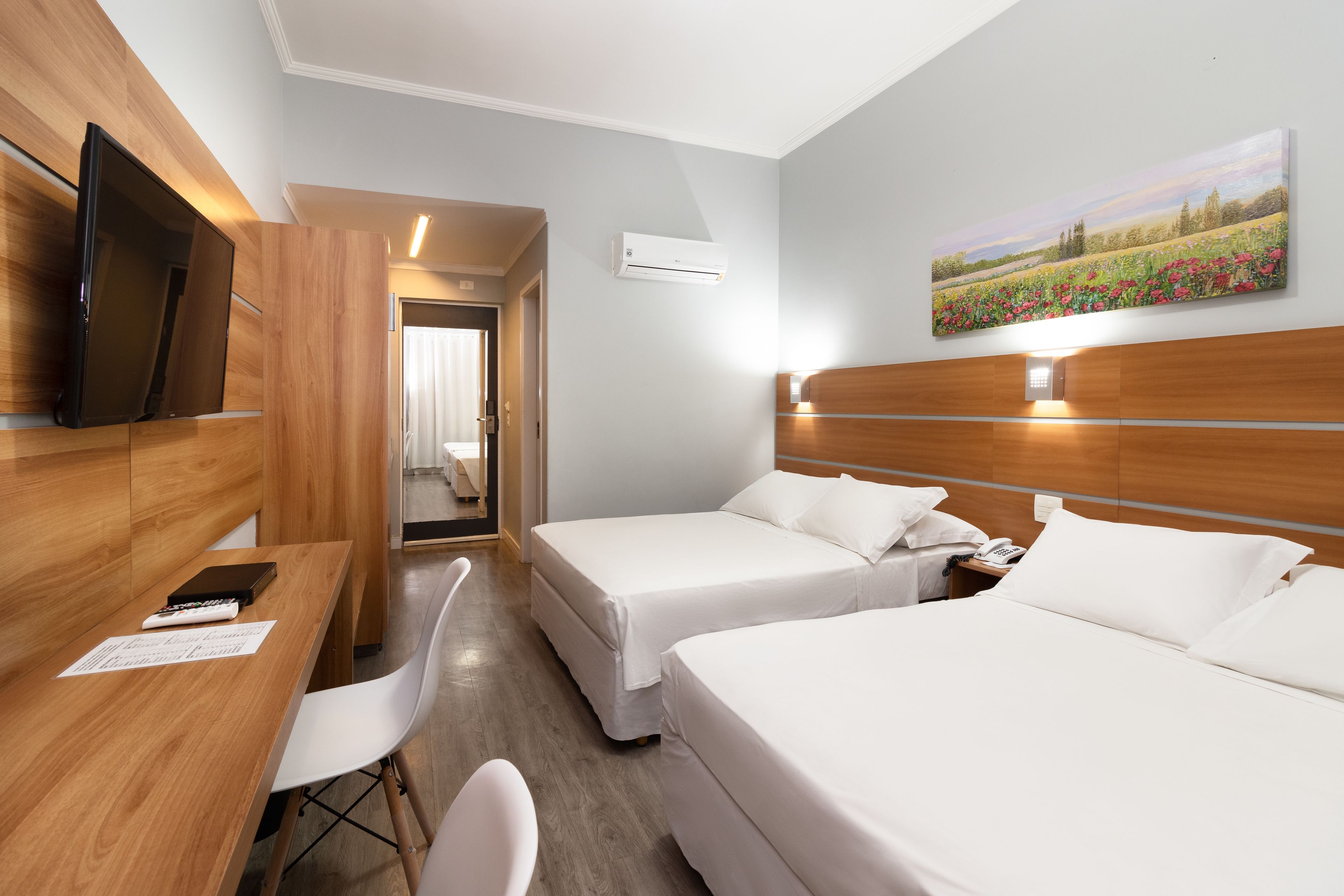 deluxe twin room | minibar, in-room safe, desk, blackout curtains