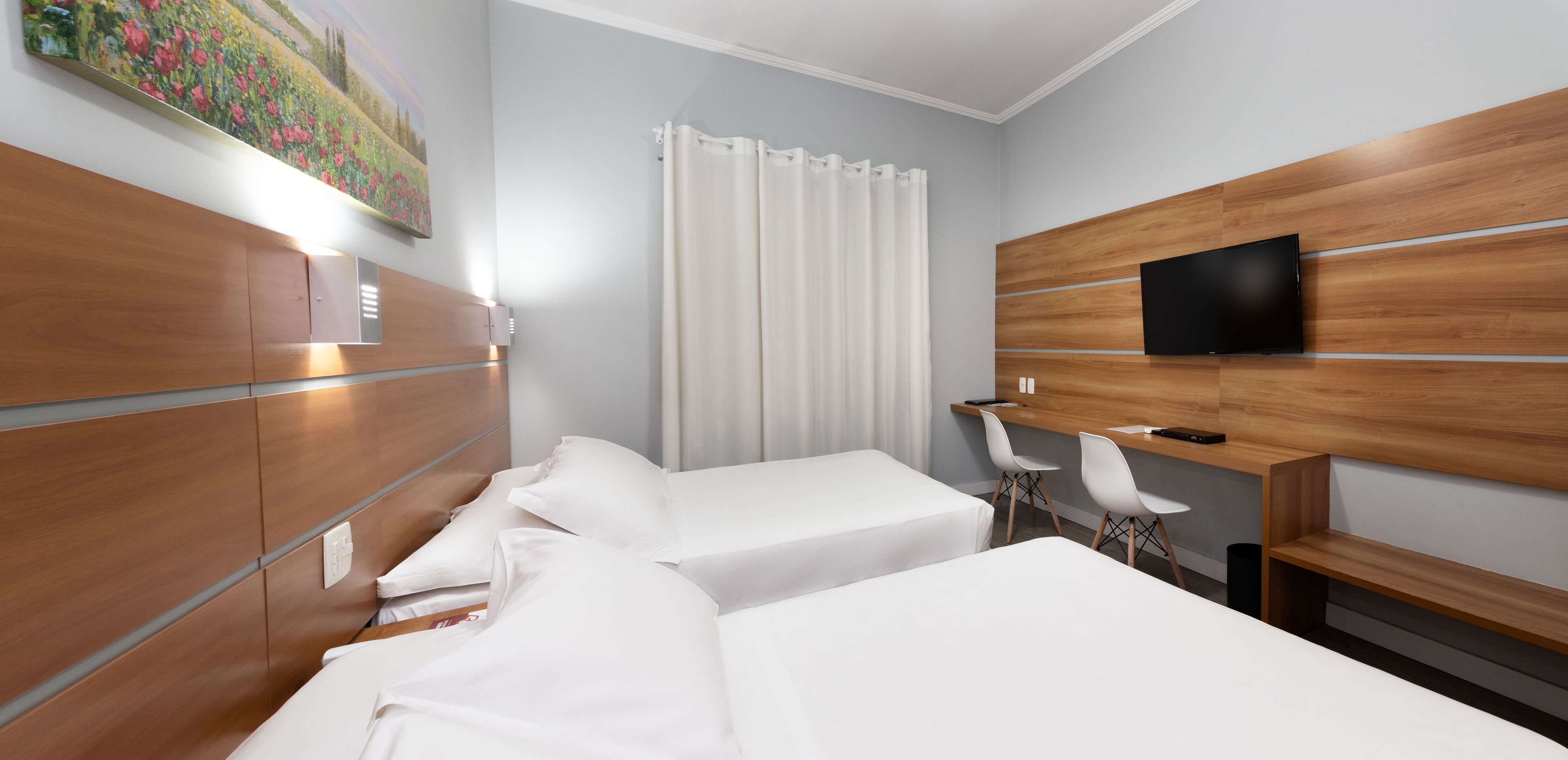 deluxe twin room | bathroom | shower, hair dryer, towels