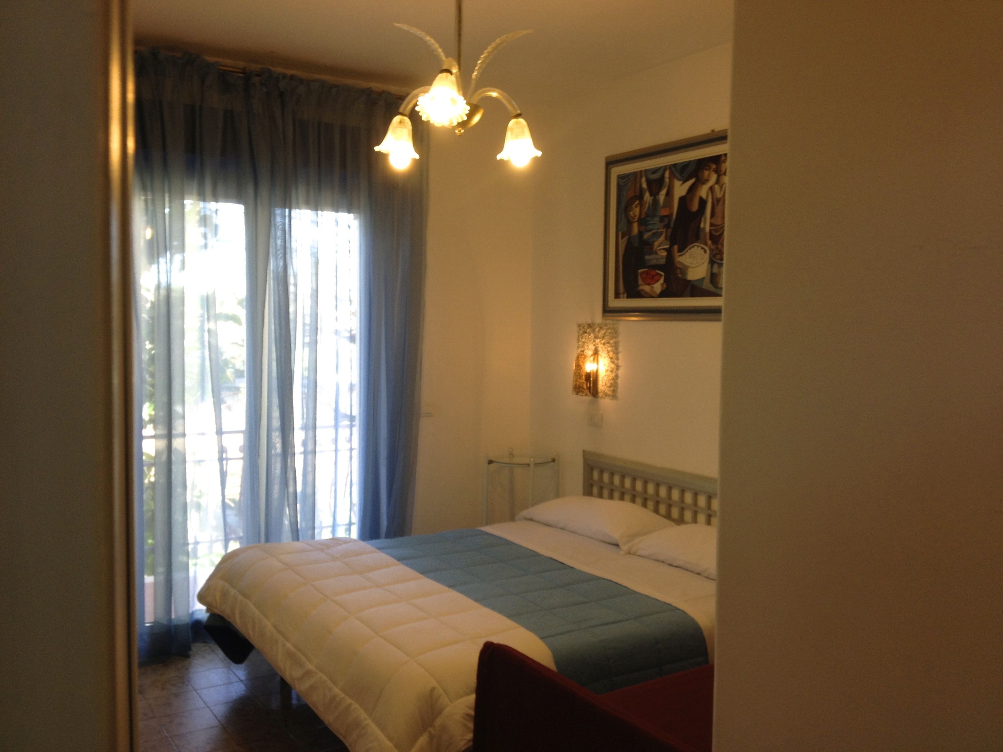 family room | 1 bedroom, in-room safe, desk, iron/ironing board