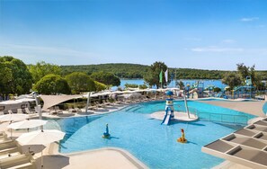 2 outdoor pools, open 9 AM to 7 PM, pool umbrellas, pool loungers