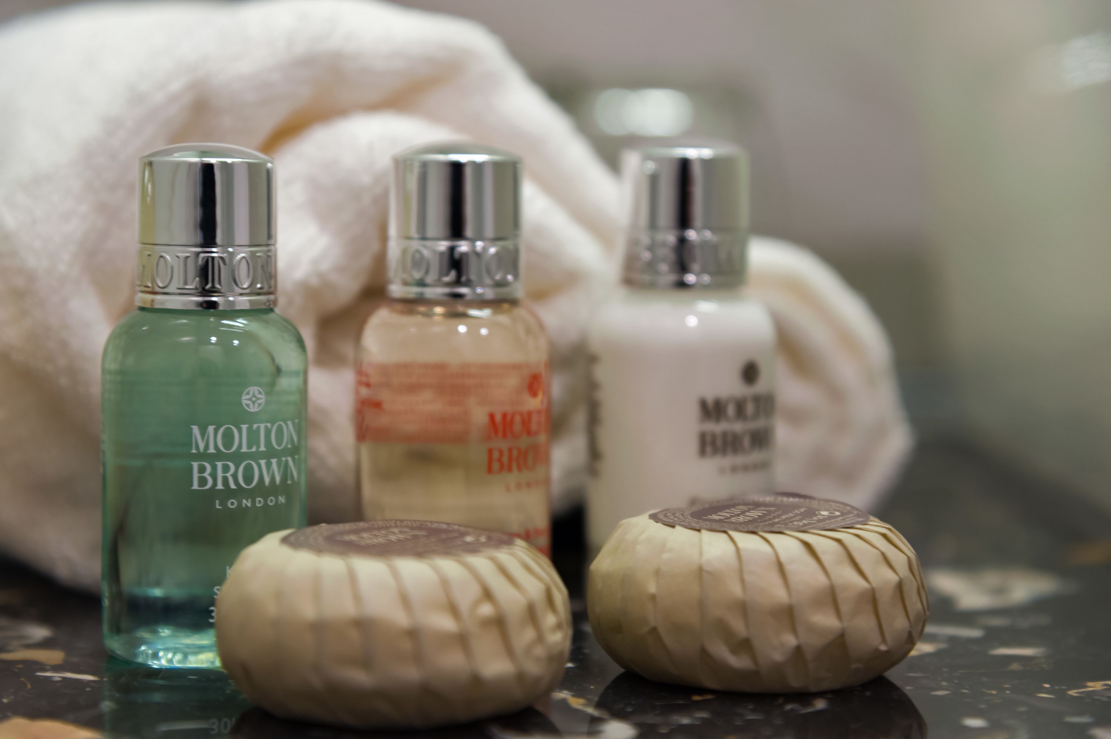 luxury two bedroom suite | bathroom amenities | free toiletries, hair dryer, slippers, towels