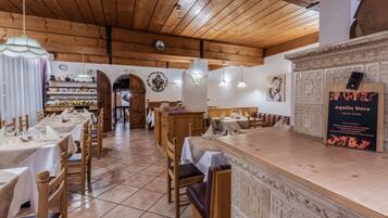 2 restaurants, breakfast, lunch, dinner served; local cuisine