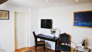 Luxury Double Room, 1 Bedroom, Garden View, Garden Area | Living area | 32-inch flat-screen TV with satellite channels, TV