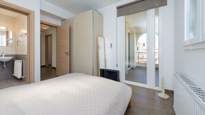 Blackout curtains, soundproofing, free WiFi, bed sheets