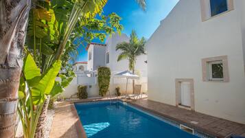 Outdoor pool, pool umbrellas, pool loungers