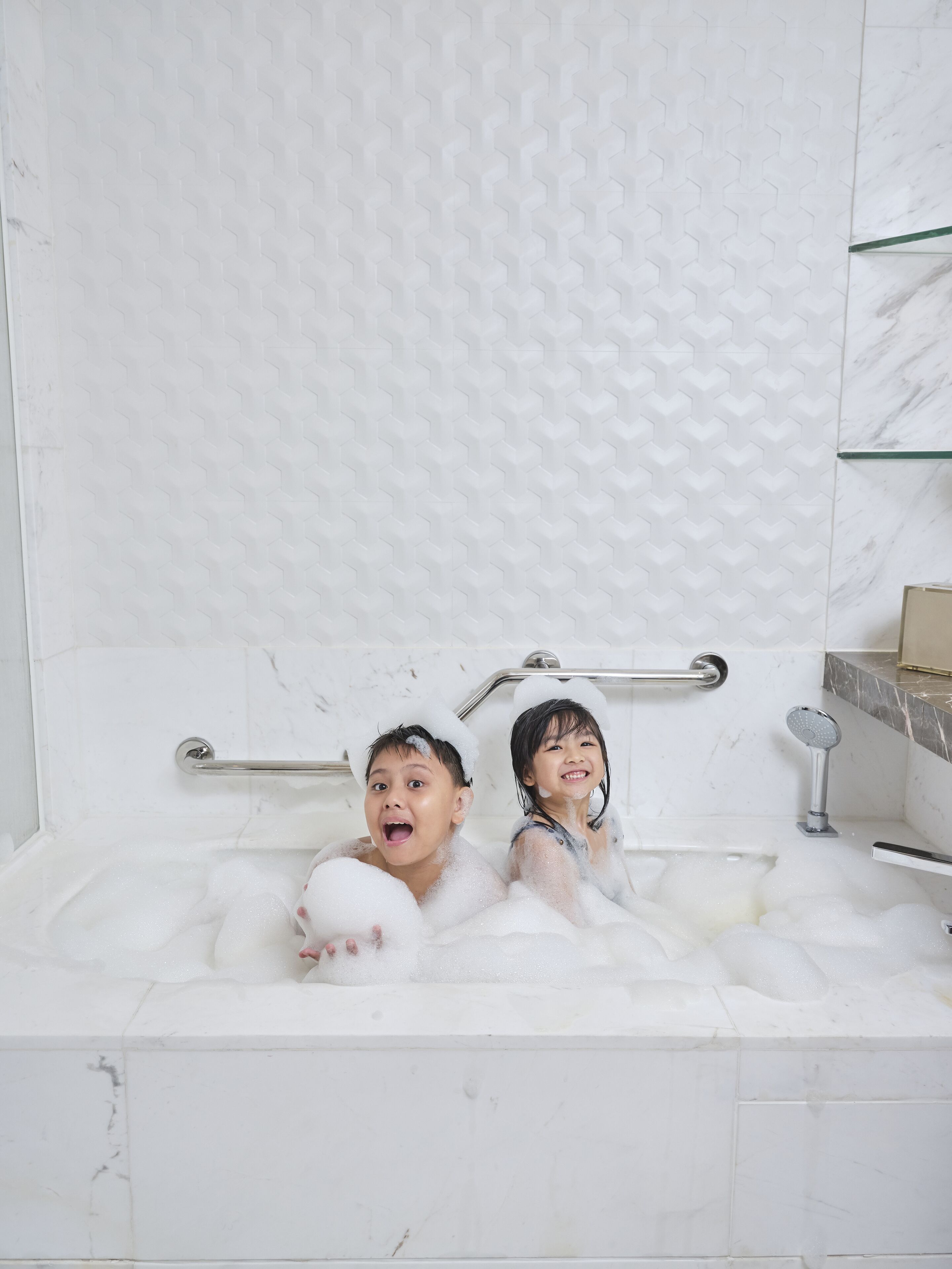 Separate tub and shower, rainfall showerhead, free toiletries