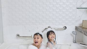 Separate tub and shower, rainfall showerhead, free toiletries
