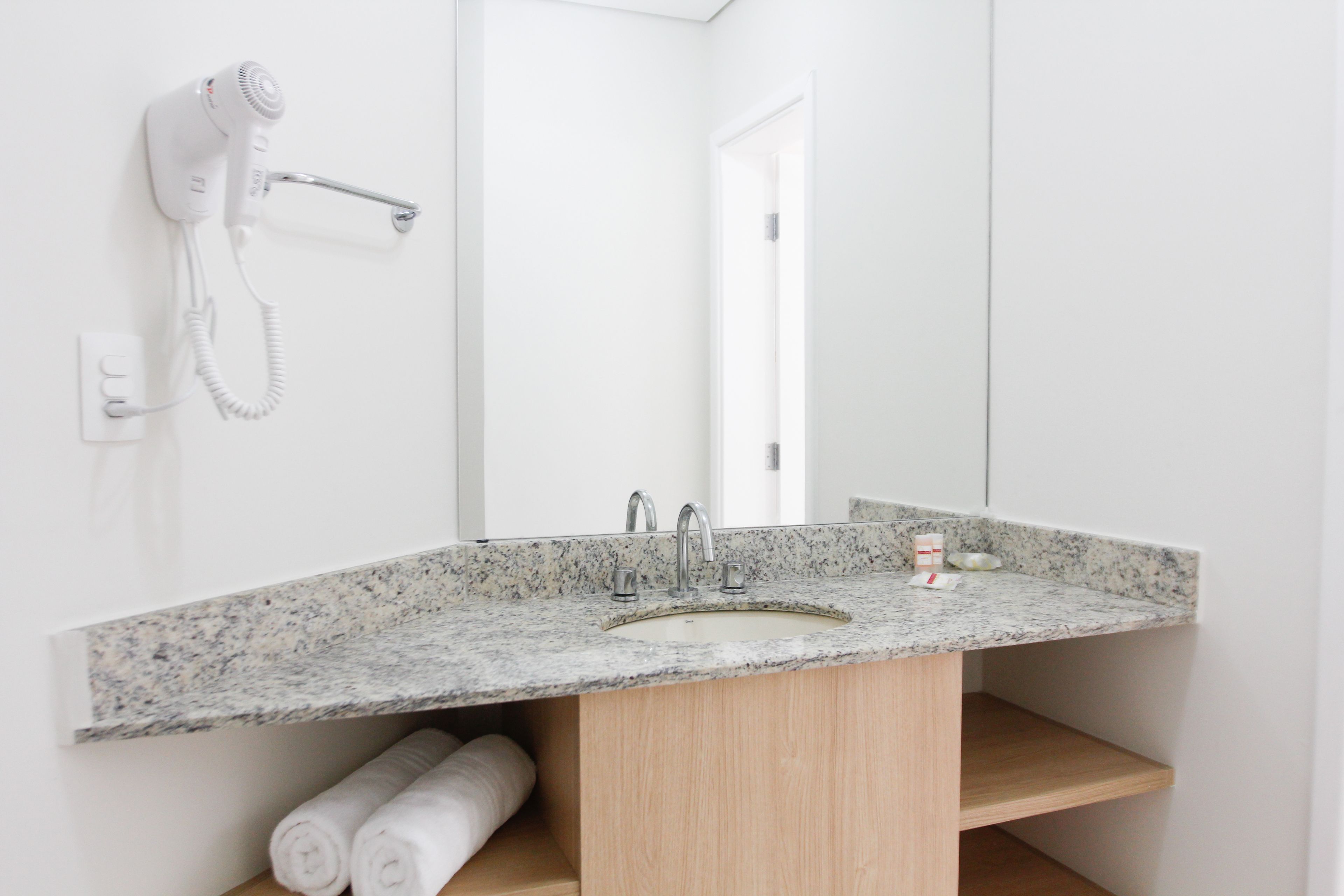 deluxe room | bathroom | shower, free toiletries, hair dryer, towels