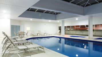 2 indoor pools, open 10:00 AM to 9 PM, pool loungers