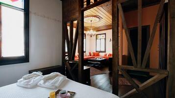 Suite, 1 Bedroom | Living area | LED TV