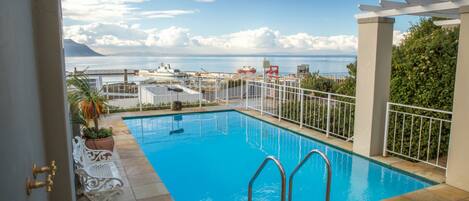 Outdoor pool, pool umbrellas, pool loungers