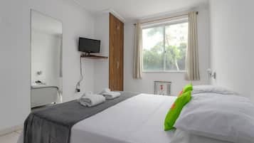 Cortinas blackout, Wi-Fi de cortesia, roupa de cama