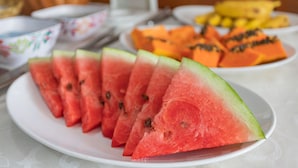 A plate of watermelon slices on a table. - Real Grandeza (Rio de Janeiro)