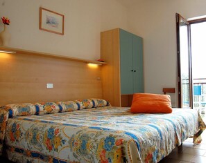 Premium bedding, down duvets, in-room safe, desk