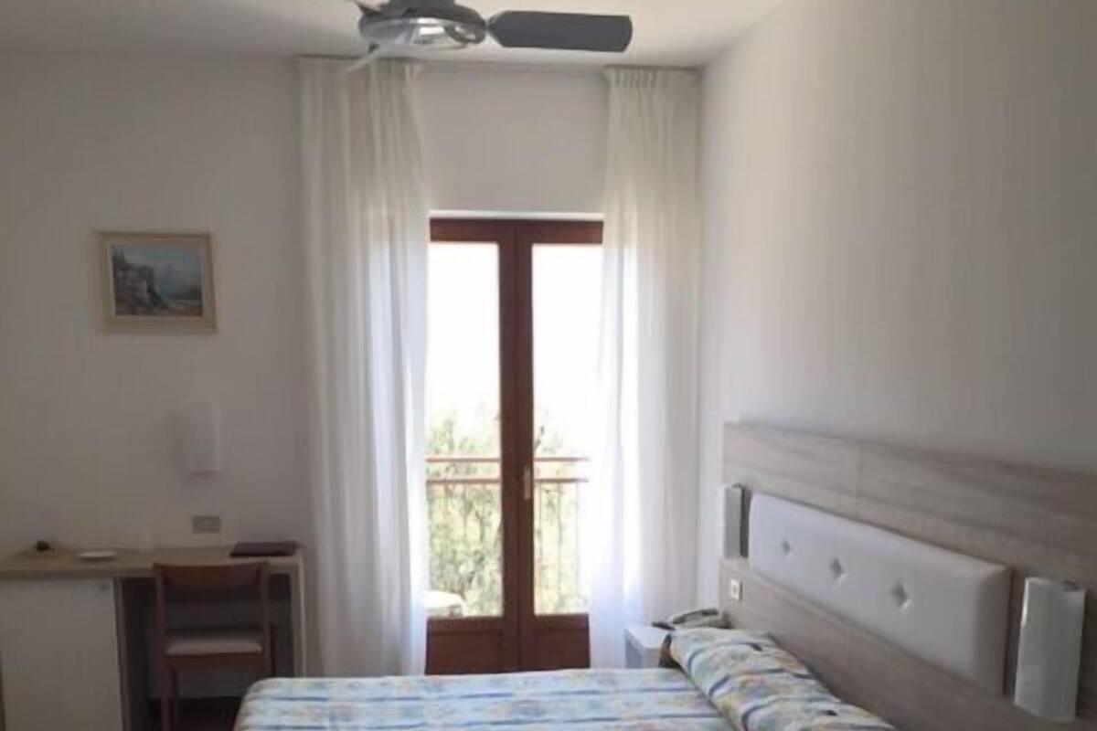 Premium bedding, down duvets, in-room safe, desk