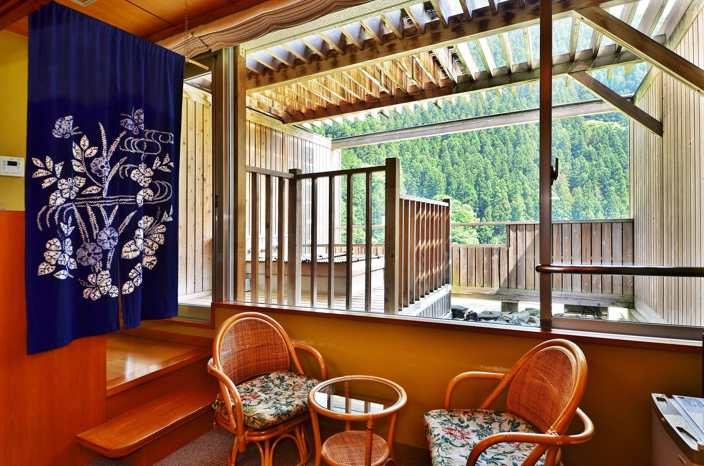 Japanese Style Room with Open Air Bath, Mountain View | Living area | Flat-screen TV
