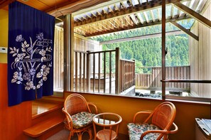 Japanese Style Room with Open Air Bath, Mountain View | Living area | Flat-screen TV - Sunriver Oboke (Miyoshi)