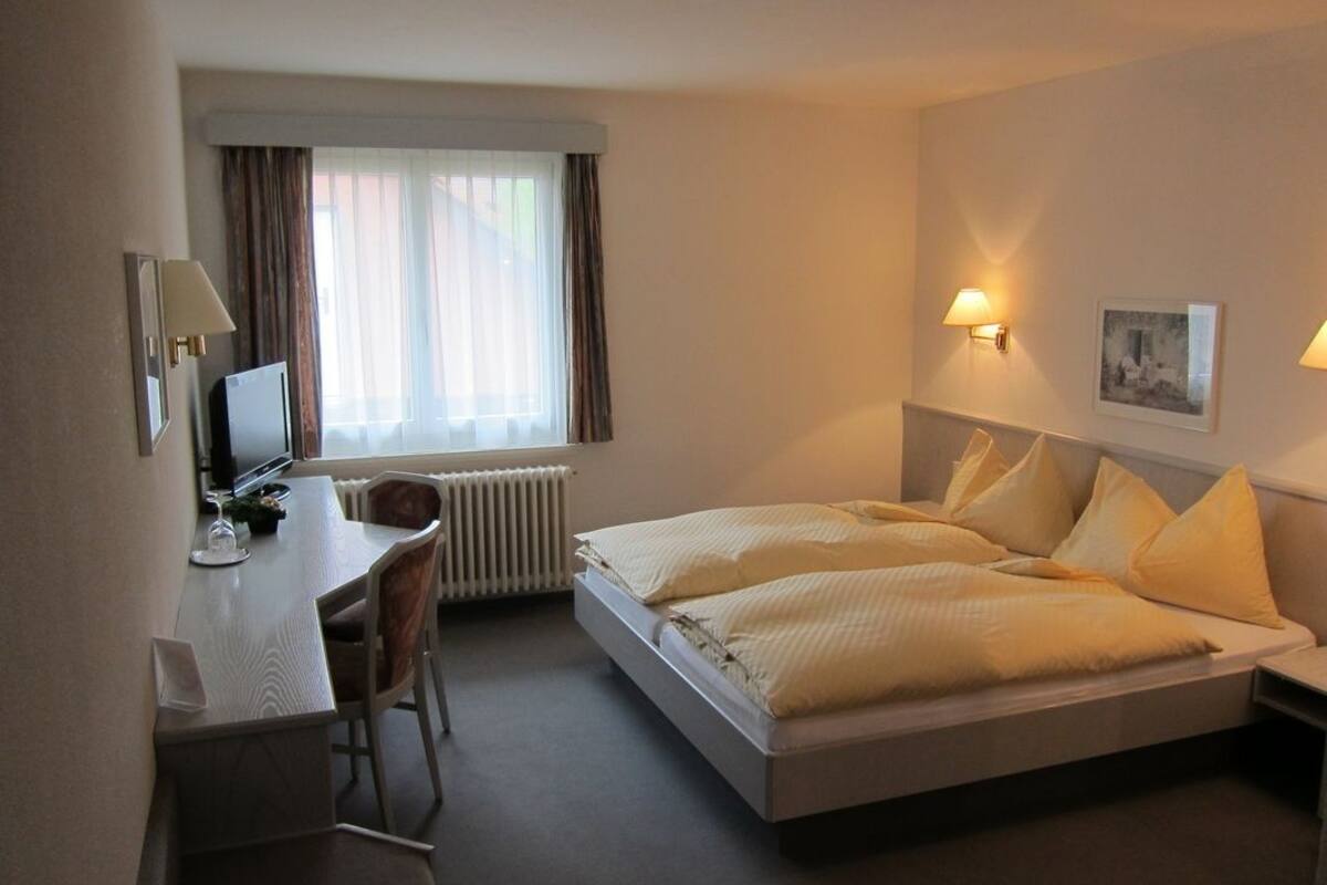 double room | down duvets, pillow-top beds, desk, rollaway beds
