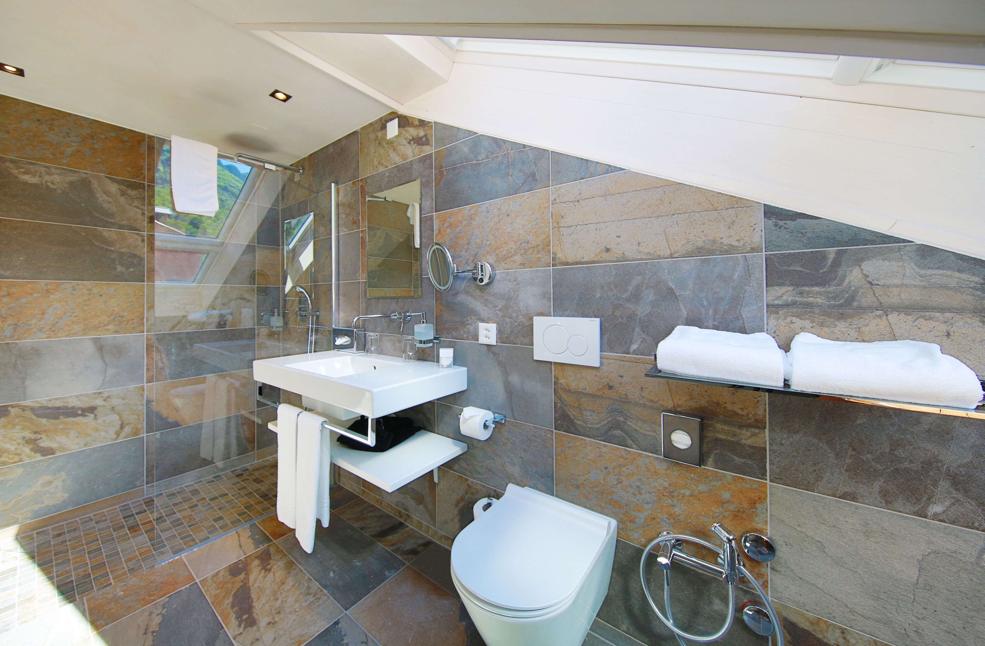 junior loft | bathroom | shower, eco-friendly toiletries, hair dryer, towels