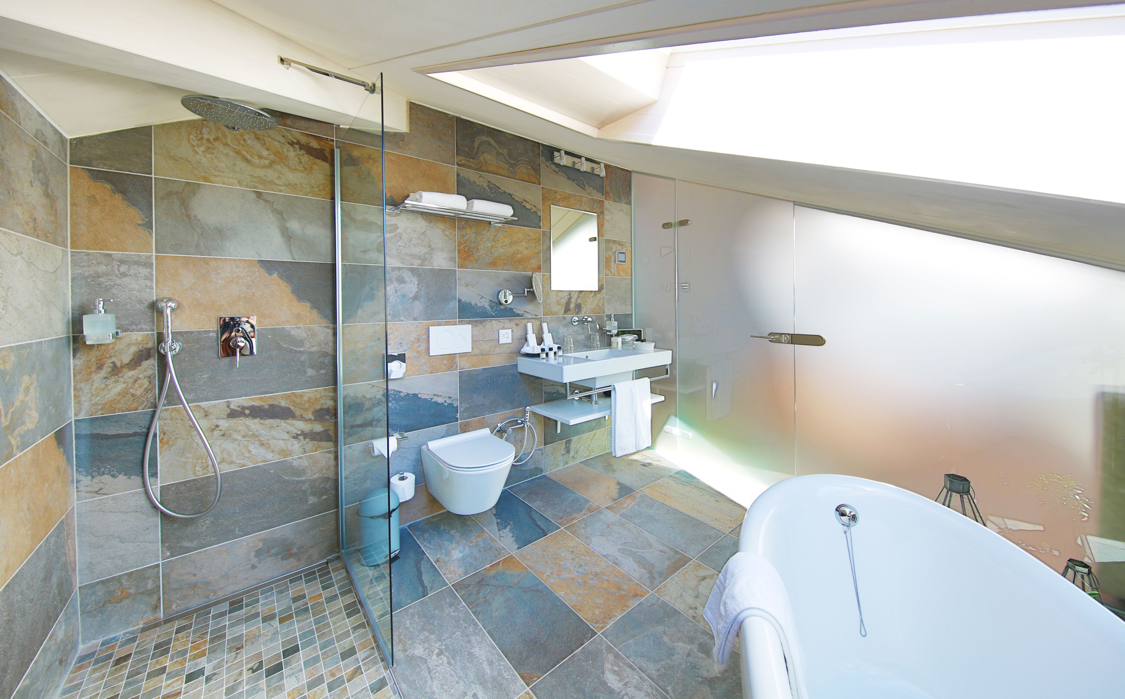 suite | bathroom | shower, eco-friendly toiletries, hair dryer, towels