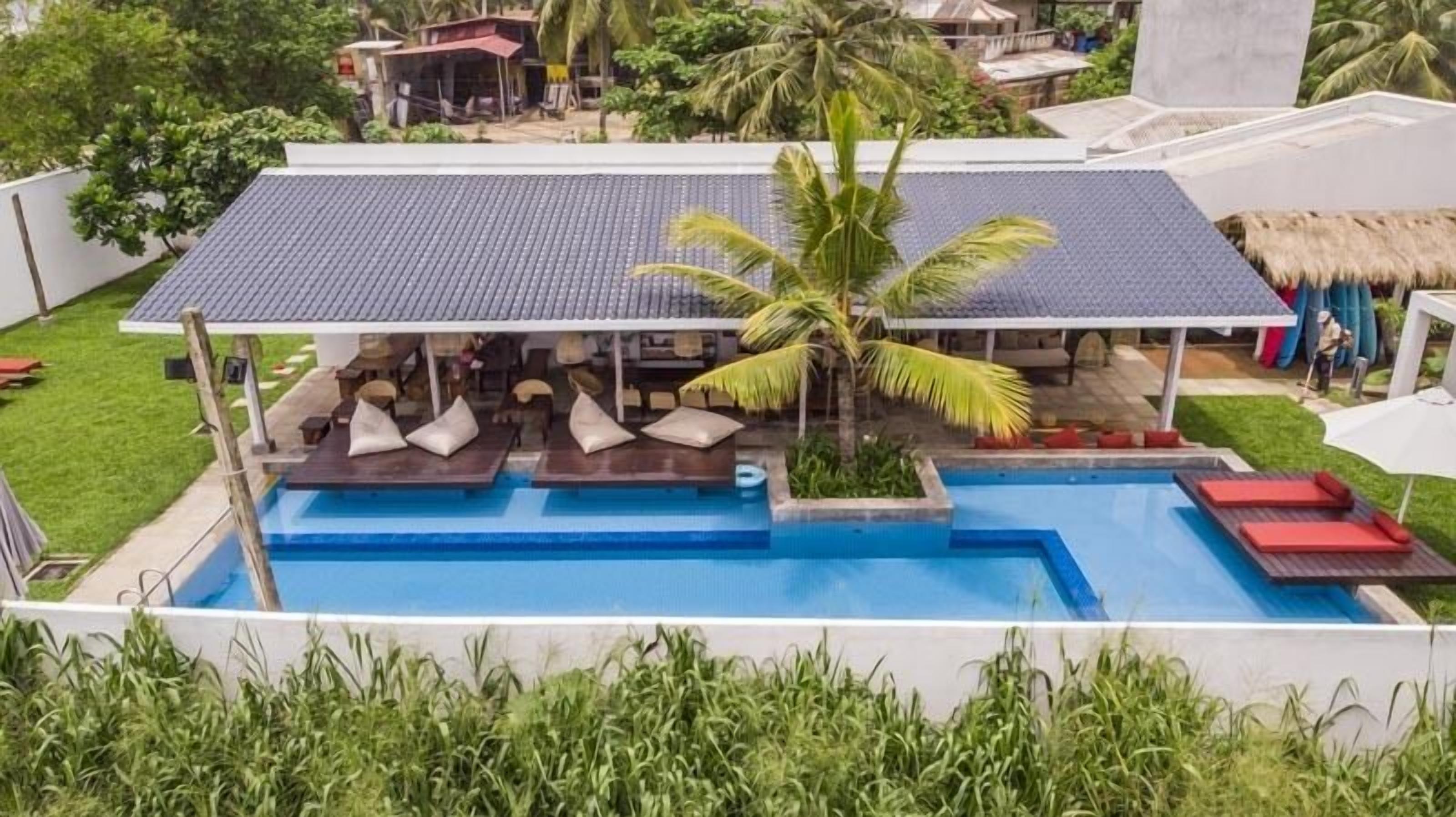 outdoor pool, pool umbrellas, pool loungers