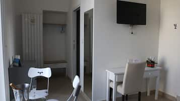 Deluxe Double Room, 1 Queen Bed, Non Smoking, Partial Sea View | Living area | Flat-screen TV