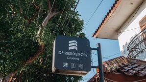 A sign for DS Residences in Sinabung with social media icons. - DS Residence Sinabung (Semarang)