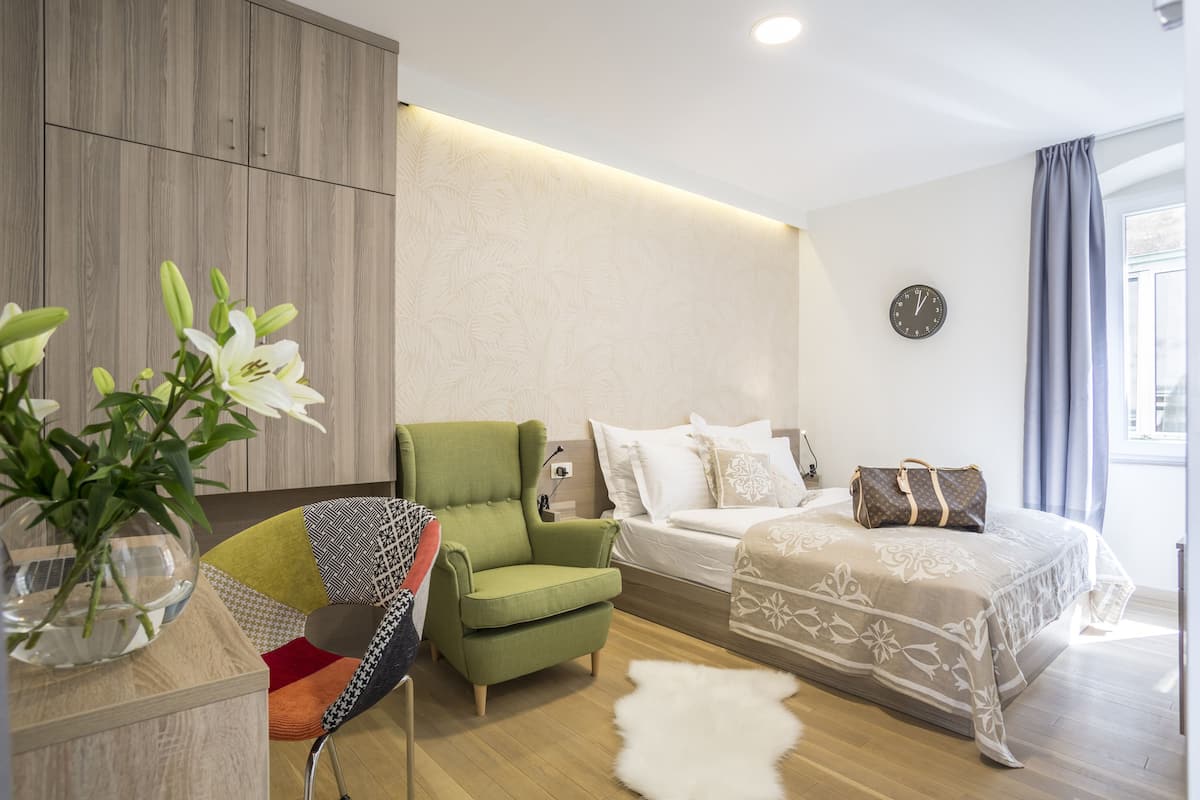 Double Room with Balcony | Una cassaforte in camera, insonorizzazione, Wi-Fi gratuito, lenzuola