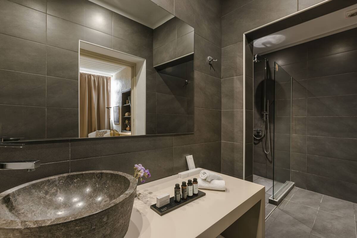 superior double room | bathroom | shower, designer toiletries, hair dryer, bathrobes