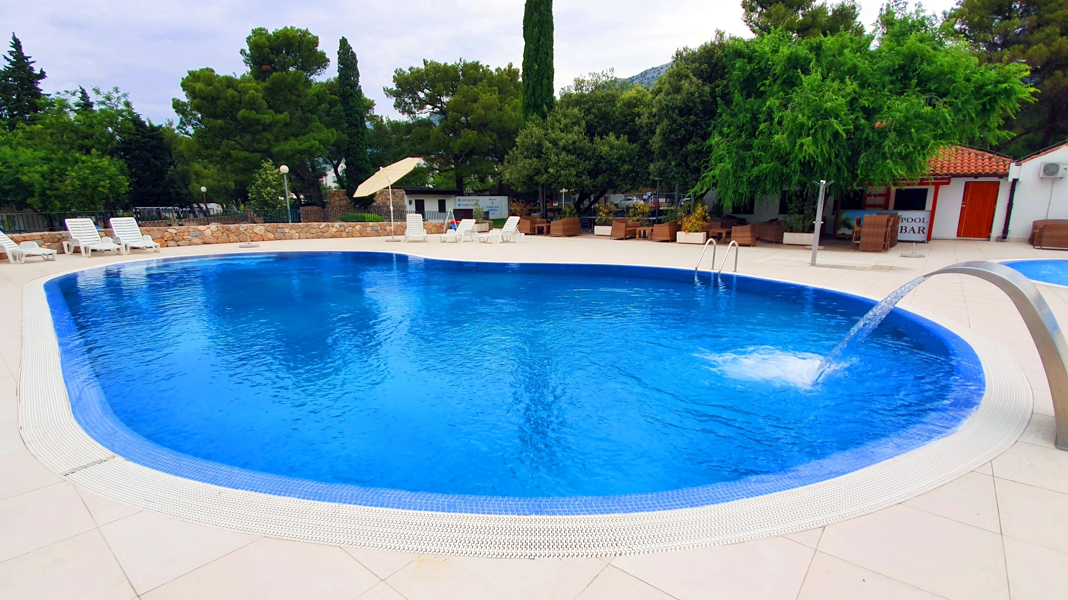 Outdoor pool, pool umbrellas, pool loungers