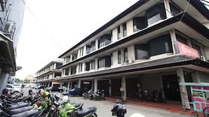 A multi-story building with a commercial ground floor. - DS Residence Siliwangi (Semarang)