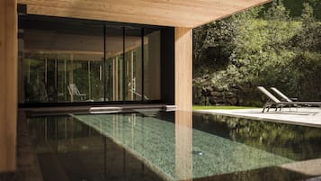 Indoor pool, outdoor pool, open 7:00 AM to 7:00 PM, pool loungers